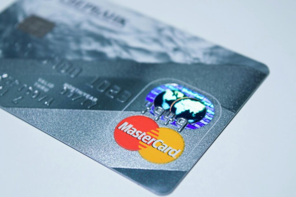 detail-shot-of-a-mastercard-credit-card-showing-the-chip-and-logo.-210742-1536x1021